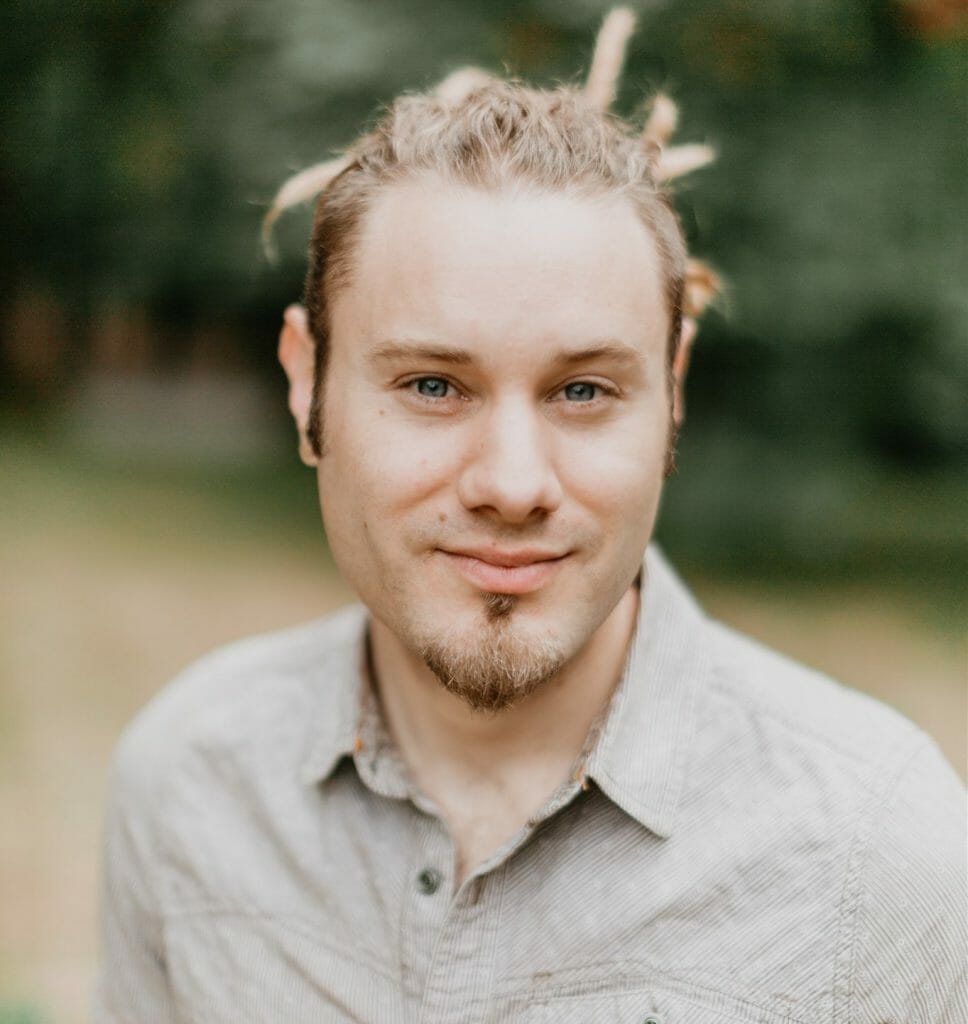 photo of Simon Yugler, a white man with blond hair and a goatee.